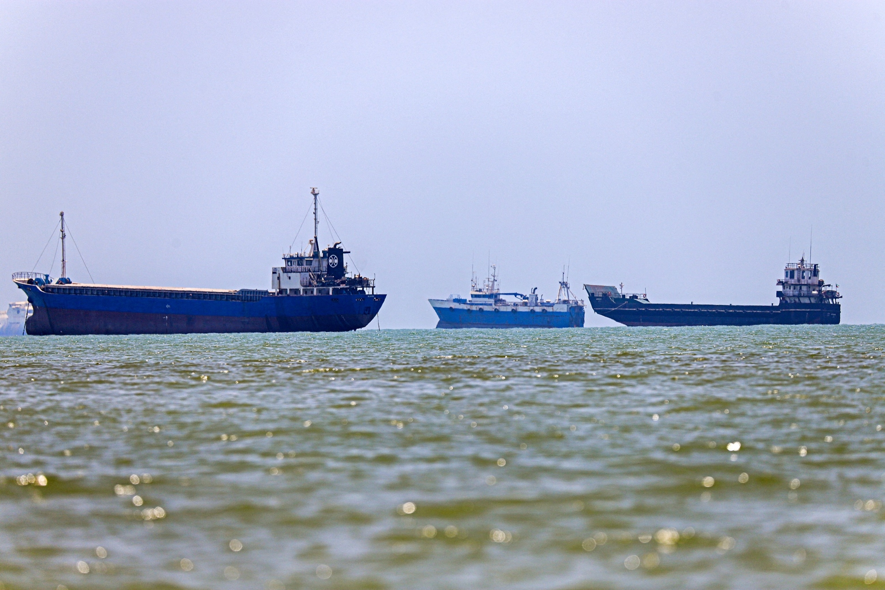 In this picture obtained from Iran's ISNA news agency on June 18, 2026, vessels are seen anchored in Bandar Abbas along the Strait of Hormuz.Amirhossein Khorgooei/ISNAvia AFP via Getty Images, FILE