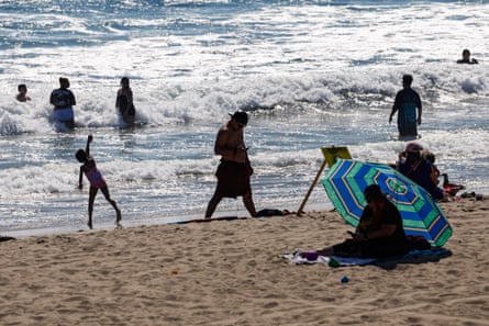People hit the beach in Santa Monica, California, on 21 July 2026.Photograph: Chris Torres/EPA