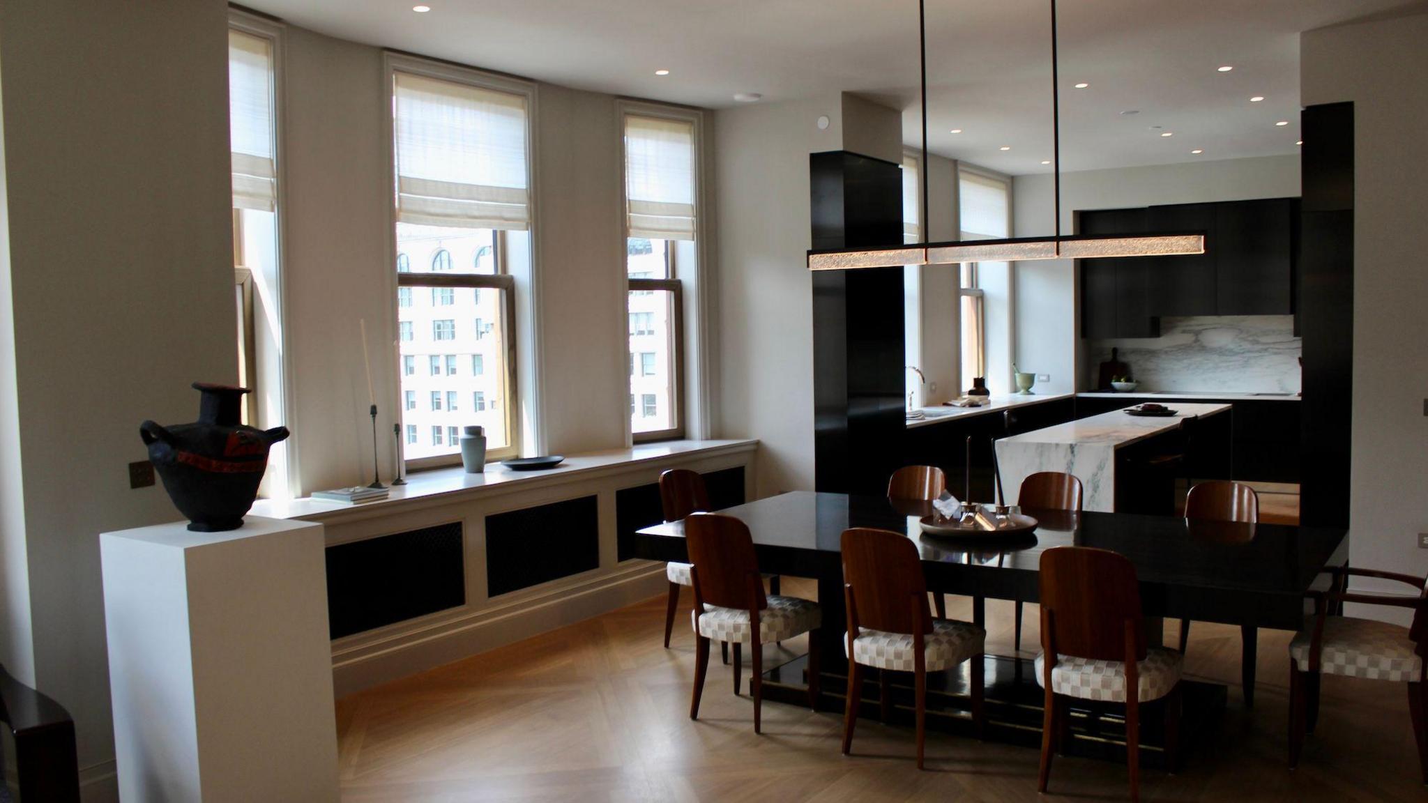 Image caption,The windows, seen here in the 12th floor model unit on the south side, throughout the building have been replaced