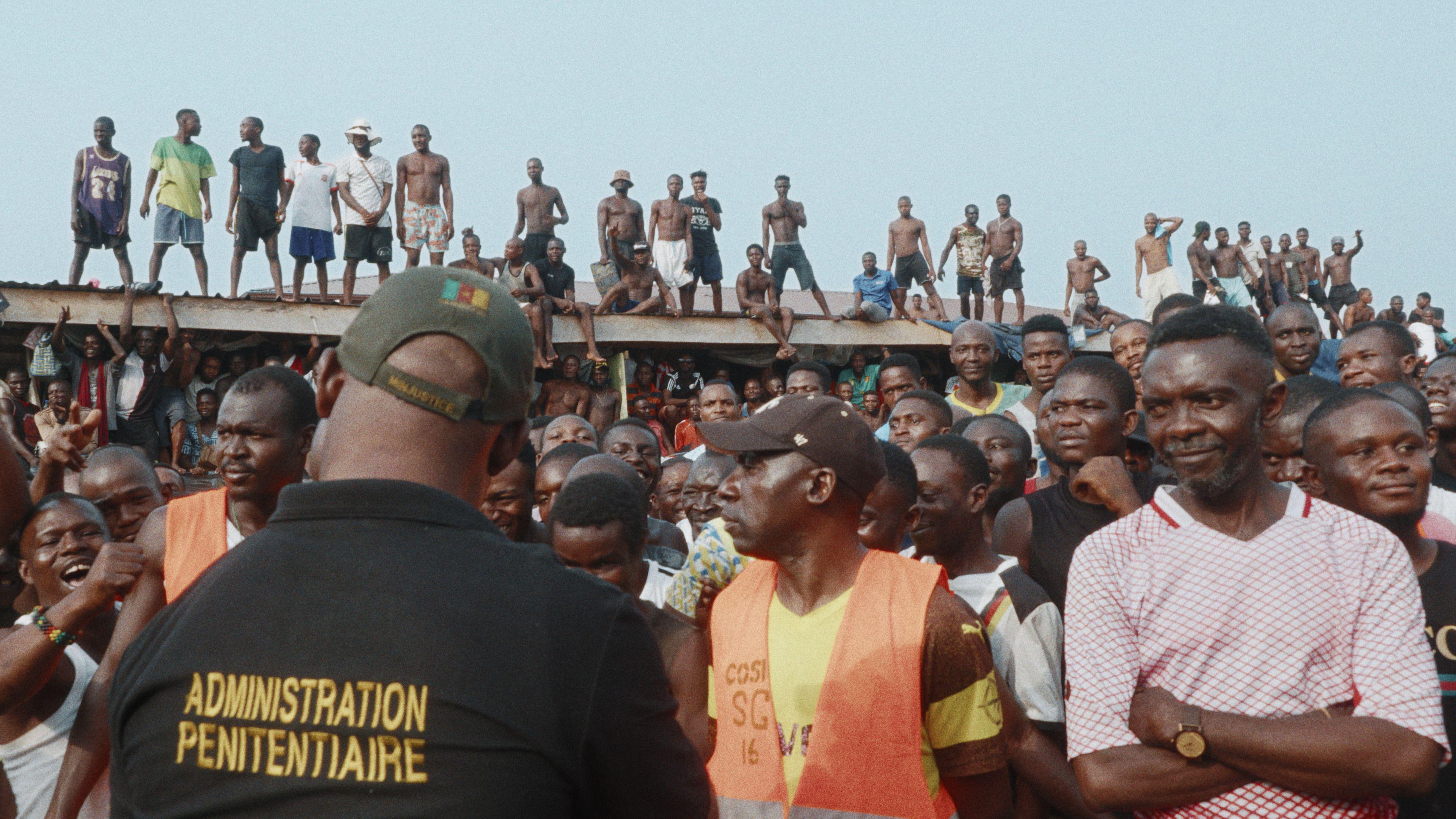 Image caption,The inmates attempt to secure an optimal view for the Jail Time Records concert in February