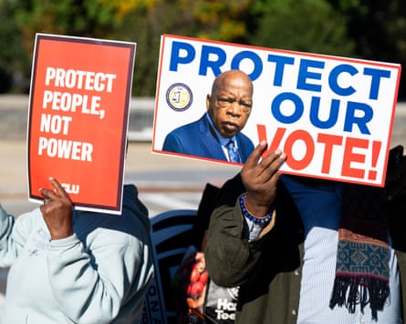 Voting rights activists protest outside the US supreme court.Photograph: Bill Clark/CQ-Roll Call, Inc/Getty Images