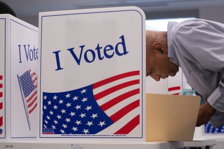 A voter works on his ballot at a polling station in Arlington, Virginia, in 2024.Photograph: AFP/Getty Images