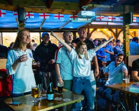 Many pubs extended capacity outside or put up big screens for the World Cup.Photograph: Jill Mead/The Guardian