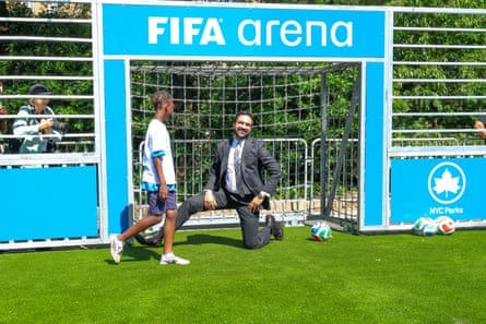 Mamdani in his suit on the football field.Photograph: Ira L Black/Fifa/Getty Images