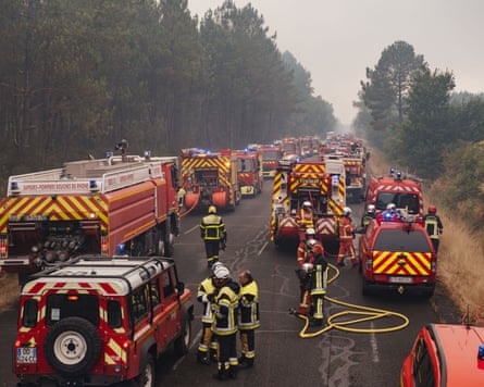 Firefighters prepare to join efforts to contain the Gironde fire.Photograph: Astrid Lagougne/EPA