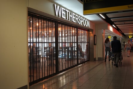 ‘I’ve never seen Wetherspoons empty,’ said one traveller who was heading to New York.Photograph: Aaron Chown/PA
