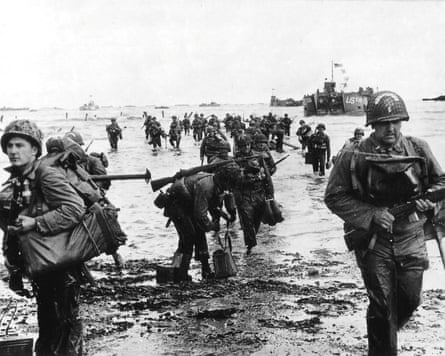 Allied troops come ashore near Vierville sur Mer on 6 June 1944.Photograph: Reuters