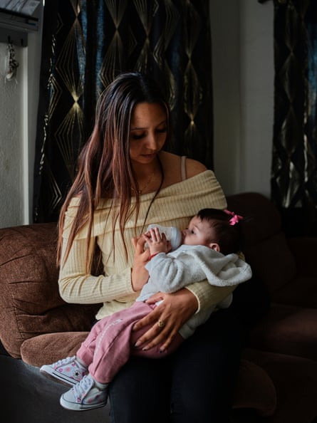 Joana Longoria poses for a portrait with her daughter Delilah.Photograph: Philip Cheung/The Guardian