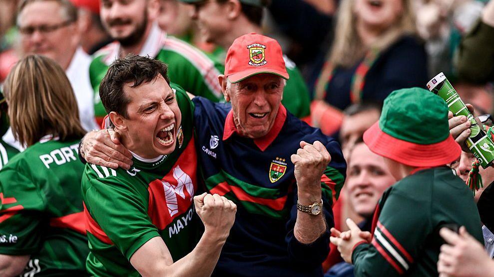 Image caption,Mayo fans celebrating their first All-Ireland win in 75 years