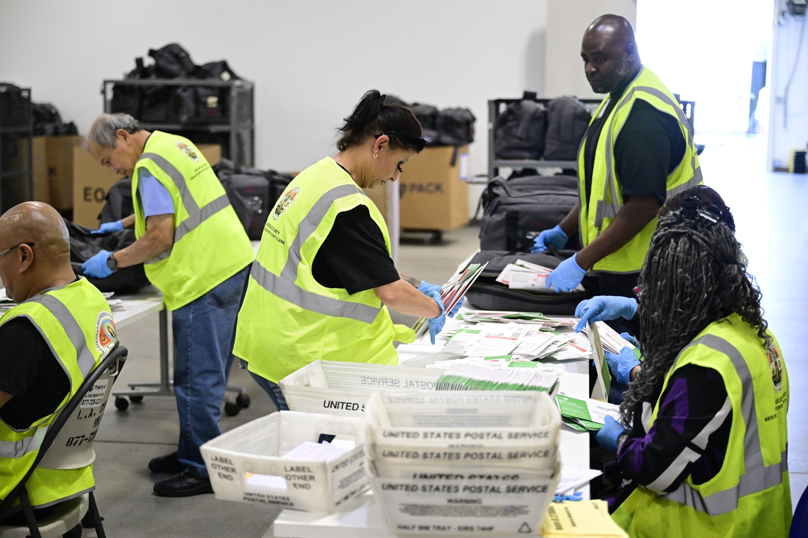 Los Angeles County election workers process ballots at the Los Angeles County Ballot Processing Center in the City of Industry, California, on Tuesday, June 2, 2026.Weston Hancock/Sipa USA via AP
