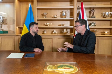 Zelenskyy talks to Burnham. The UK prime minister said: ‘It is intended to send a very clear message.’Photograph: Simon Jones/The Sun/AP
