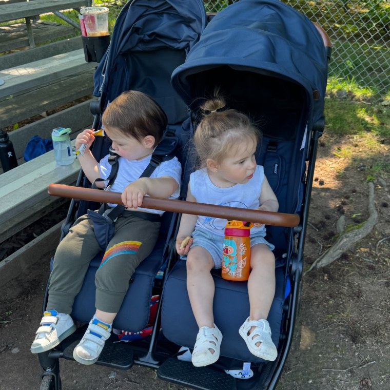The Bombi double stroller keeps snack time comfortable and secure, with a play bar that doubles as a sturdy hold for tiny hands.Courtesy Becca Delman