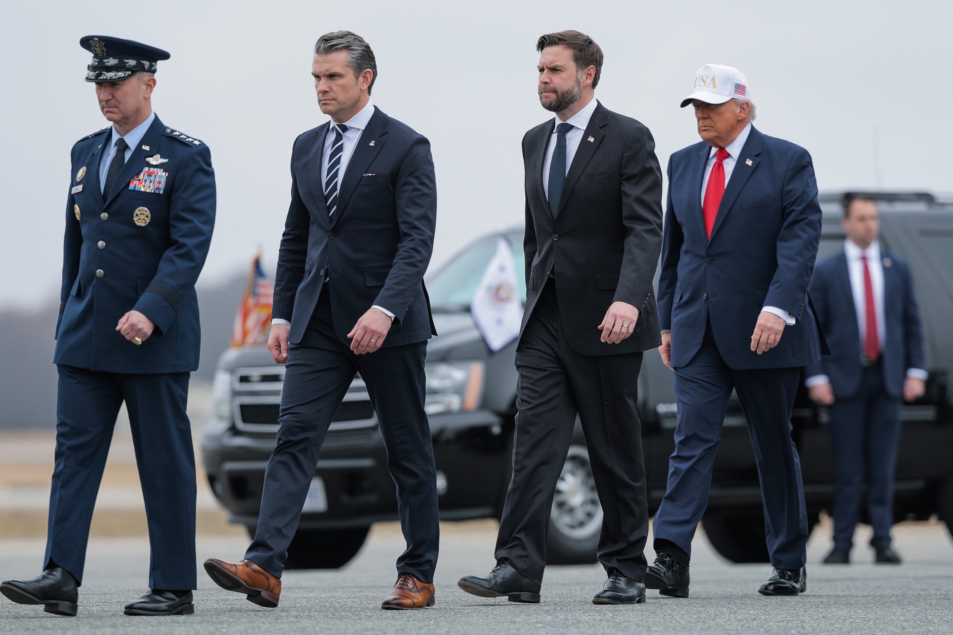 Chairman of the Joint Chiefs Of Staff Gen. Dan Caine, Secretary of War Pete Hegseth, Vice President JD Vance and President Donald Trump arrive for a dignified transfer event at Dover Air Force Base, March 7, 2026, in Dover, Del.Anna Moneymaker/Getty Images