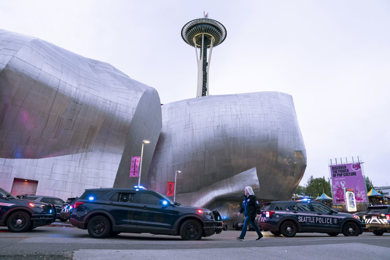 The Space Needle looms over the Museum of Pop Culture near the site of a mass shooting at the Bite of Seattle food festival Sunday.David Ryder / Getty Images