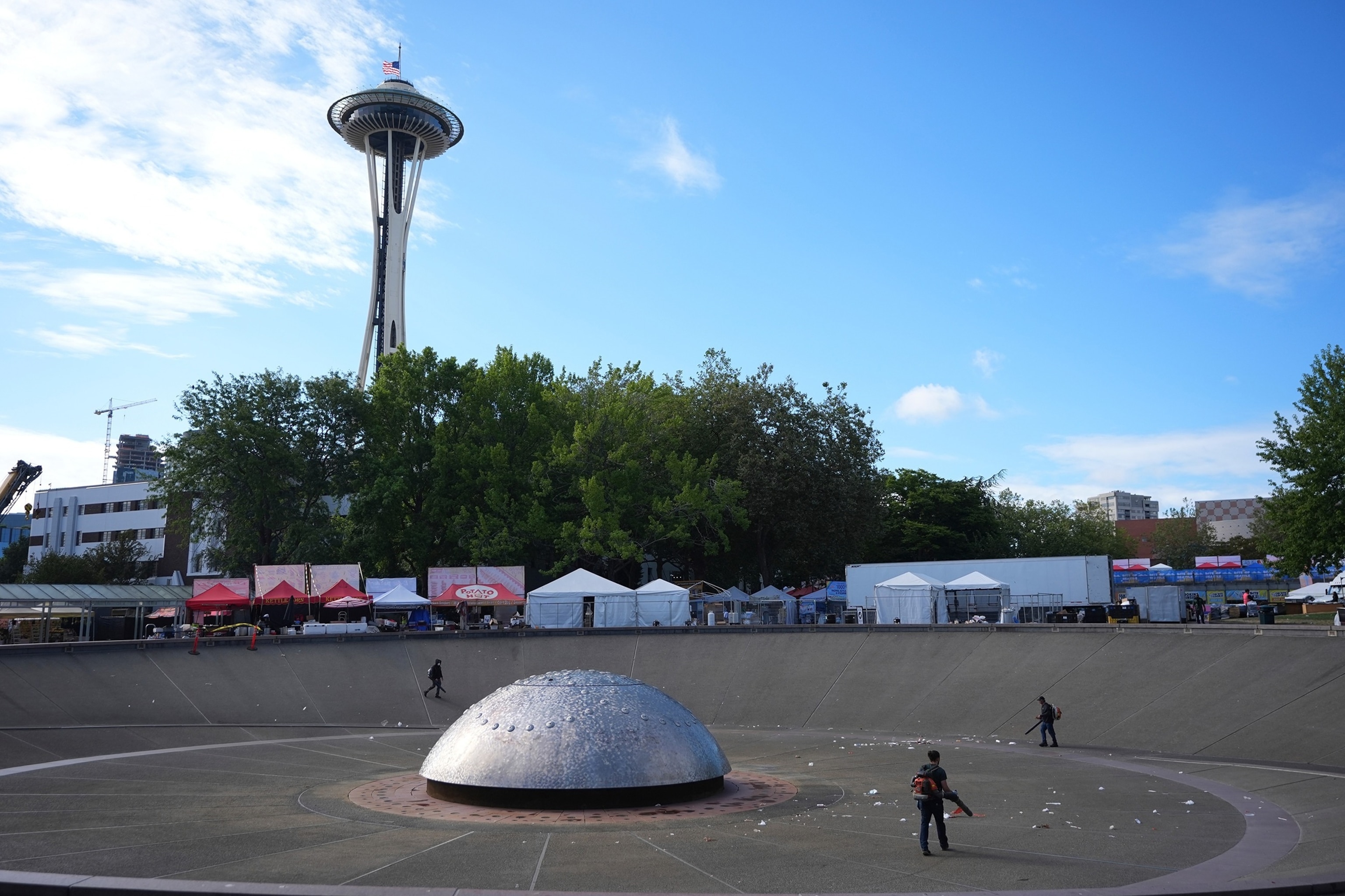 The U.S. flag flies at half staff as cleanup continues at the Space Needle the day after a shooting at Seattle Center during the Bite of Seattle food festival, July 27, 2026.Lindsey Wasson/AP Photo