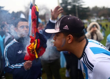 Argentina fans burn a Spain shirt after their team lost in the World Cup final.Photograph: Matias Baglietto/Reuters