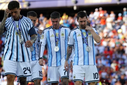 The Argentina team, including Lionel Messi (right), had to make do with silver runners-up medals after the final.Photograph: Christopher Neundorf/EPA