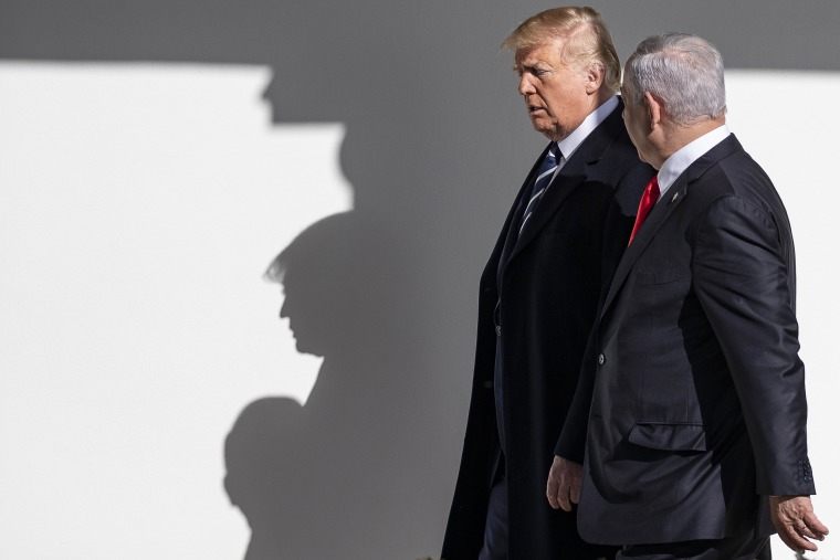 President Donald Trump walks with Israeli Prime Minister Benjamin Netanyahu outside of the White House in 2020.Alex Edelman / Bloomberg via Getty Images file
