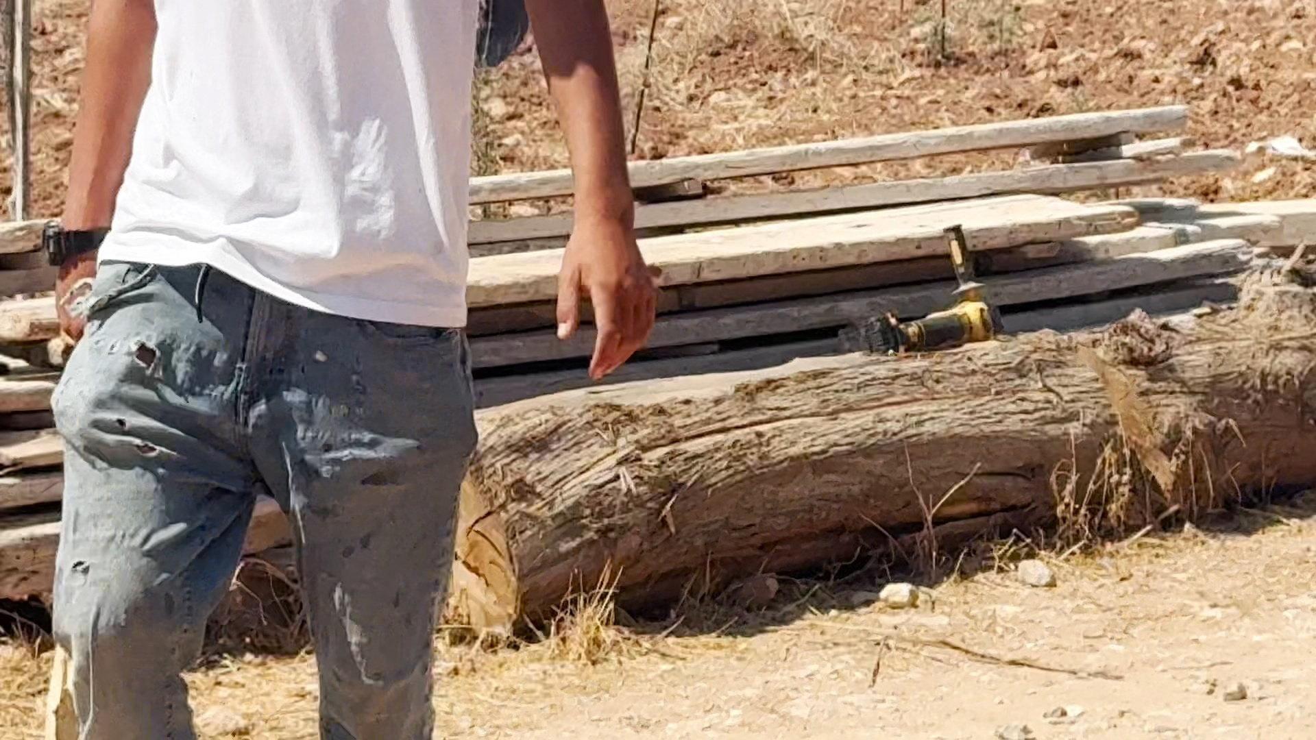 Image caption,A power tool is visible in footage showing the attack on the Abu Alia compound