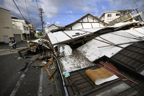 Collapsed buildings after an earthquake with a magnitude of 7.1 struck Japan’s southern Kumamoto district.Photograph: KYODO/Reuters