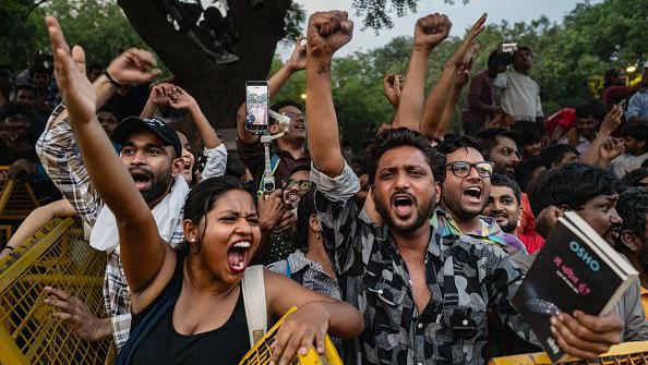 Image caption,The protests posed a rare challenge to Modi's government, becoming a wider platform for the anxieties of young people