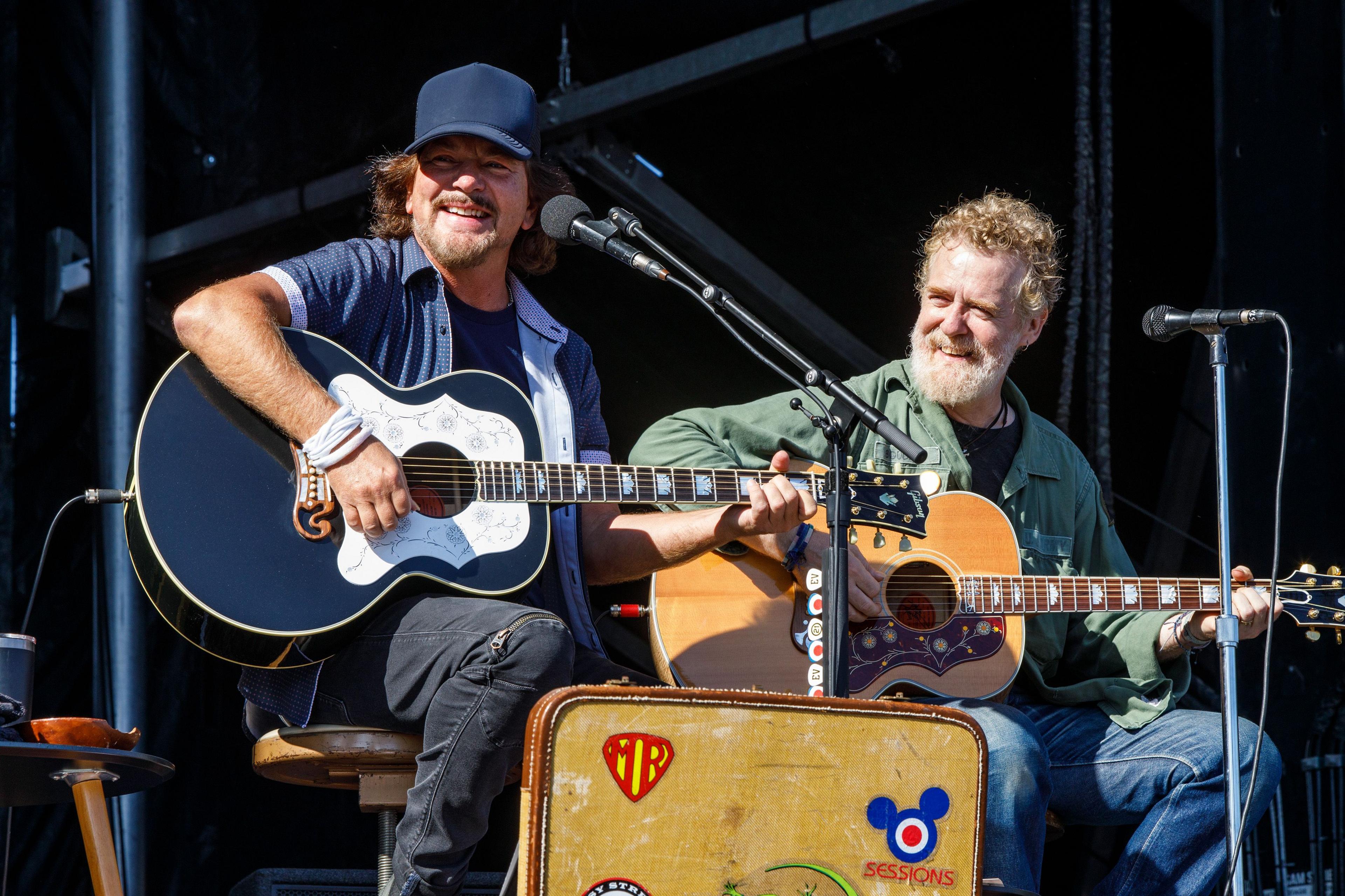 Image caption,Hansard (right) performing with Eddie Vedder at the Ohana Music Festival in 2025