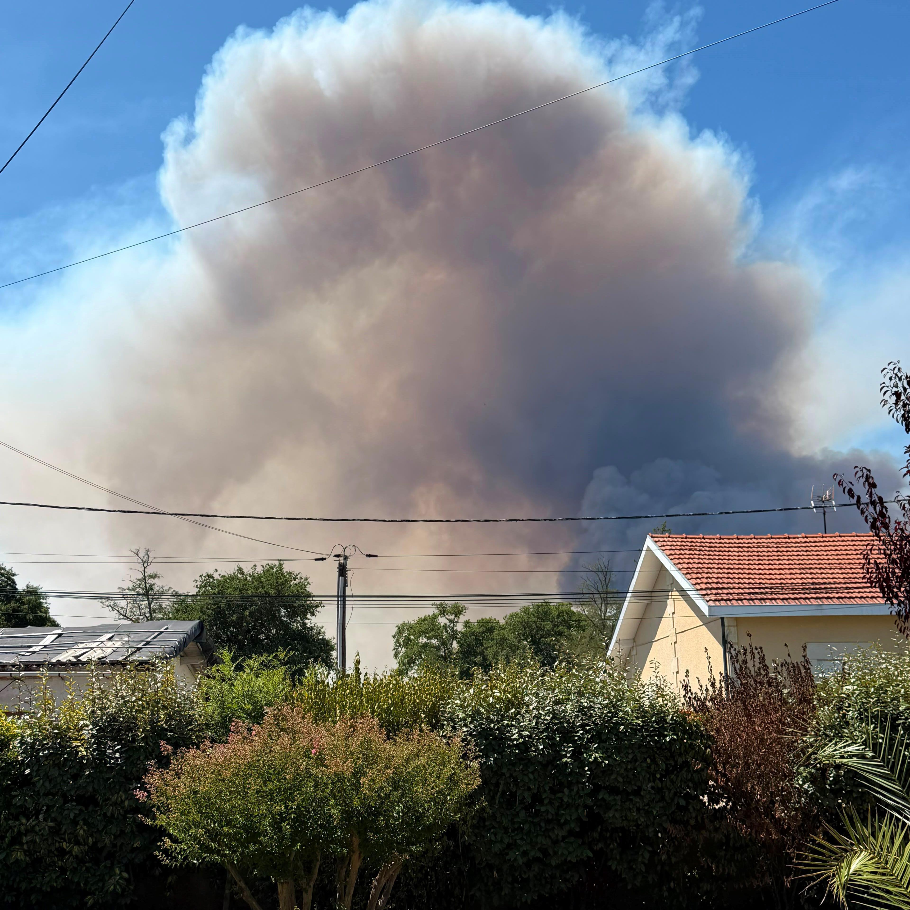 Image caption,Smoke seen from Pierre Alexandre's garden in Le Temple last Friday