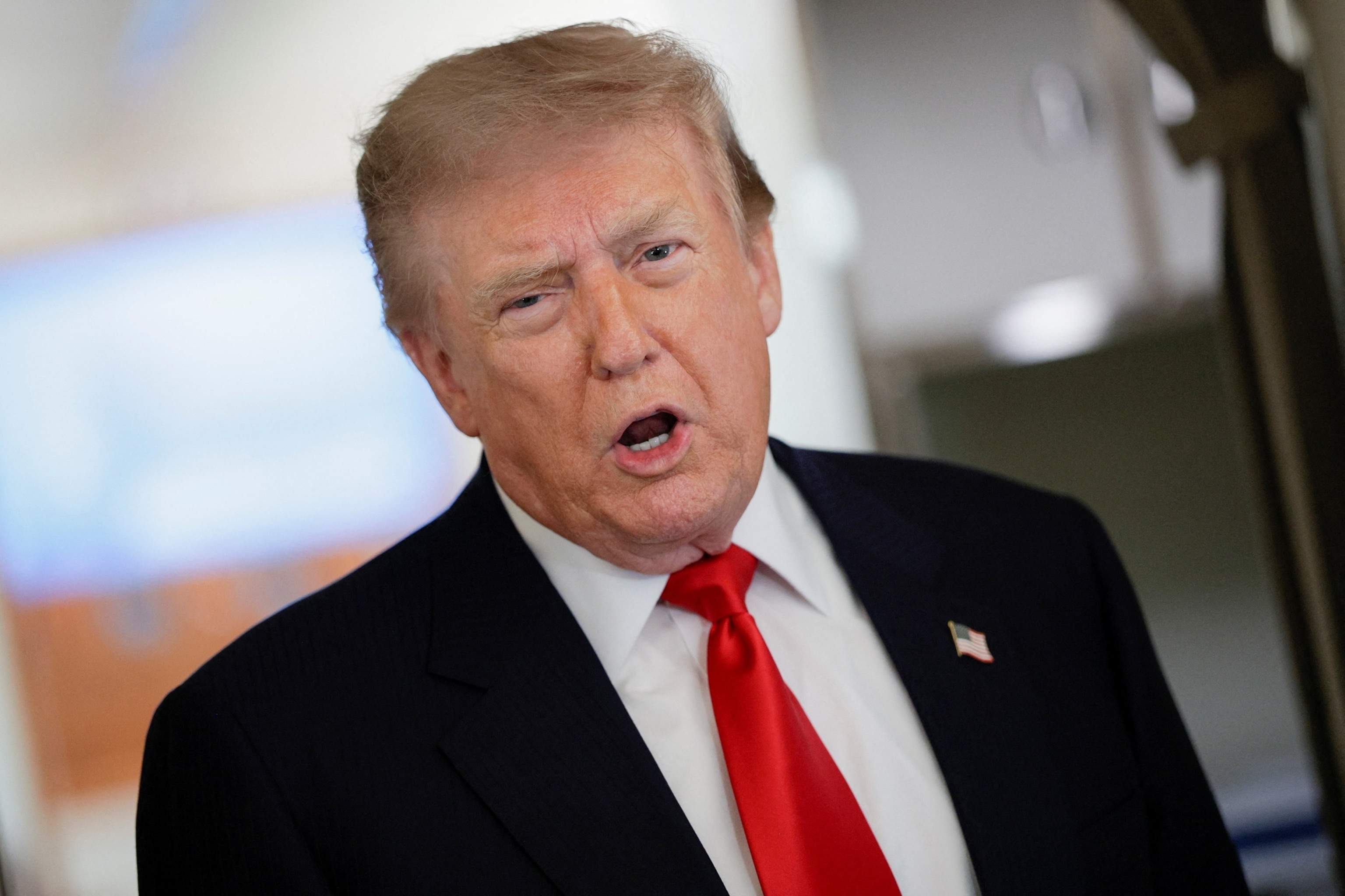 President Donald Trump speaks while aboard Air Force One for a trip to Michigan, July 27, 2026 in flight.Evan Vucci/Reuters