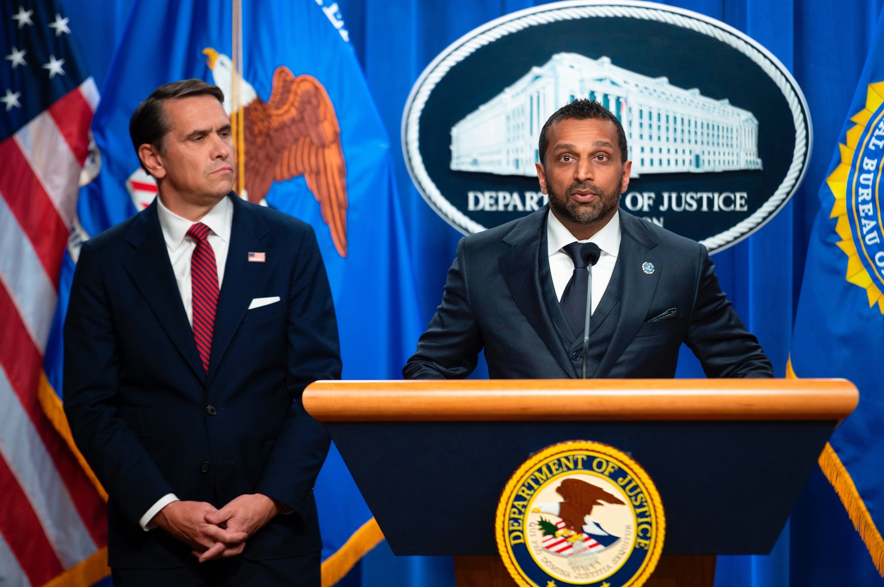 Acting Attorney General Todd Blanche, left, looks on as FBI Director Kash Patel speaks about former FBI Director James Comey indictment, at the Justice Department in Washington, Tuesday, April 28, 2026.Cliff Owen/AP