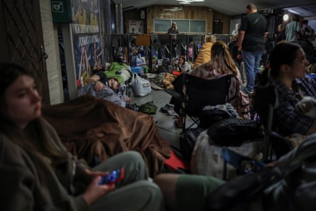 People take shelter inside a Kyiv metro station during the Russia attack.Photograph: Alina Smutko/Reuters