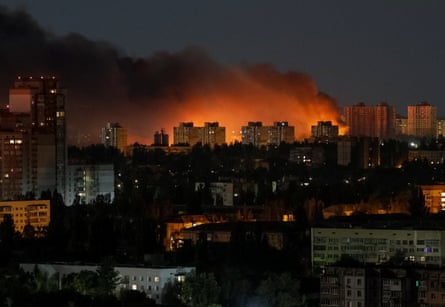 The Kyiv sky is lit up during a Russian missile attack on Wednesday night.Photograph: Gleb Garanich/Reuters
