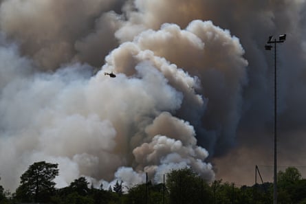 A pyrocumulonimbus, or ‘fire cloud’, in the Fontainebleau forest region, about 37 miles south of Paris, France.Photograph: Emma Da Silva/AP