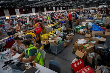 Evacuees at the Bordeaux exhibition centre in France.Photograph: Albert Llop/NurPhoto/Shutterstock