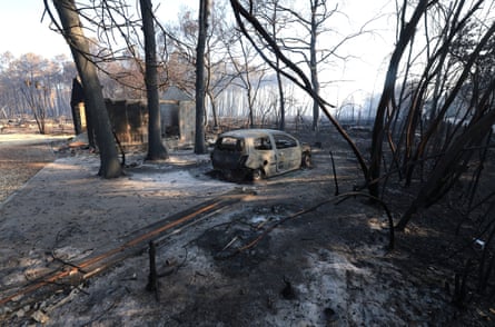 A burnt car in Gironde, France.Photograph: Yves Herman/Reuters