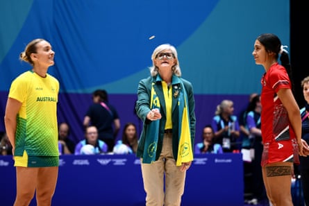 Mostyn conducts the coin toss ahead of a netball match between Australia and Tonga at the Glasgow 2026 Commonwealth Games.Photograph: Joel Carrett/AAP