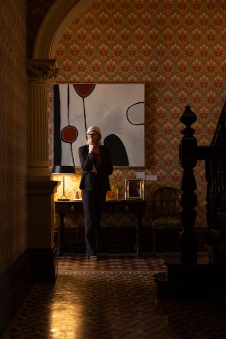 Mostyn, stands in front of an artwork by Paddy Nyunkuny Bedford at Admiralty House in Kirribilli, NSW, AustraliaPhotograph: Blake Sharp-Wiggins/The Guardian