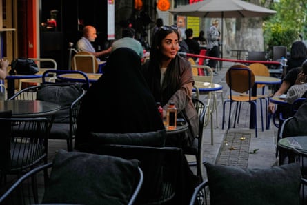 An outdoor cafe in northern Tehran. Cafes have been described by hardliners as anti-Islamic places.Photograph: Vahid Salemi/AP