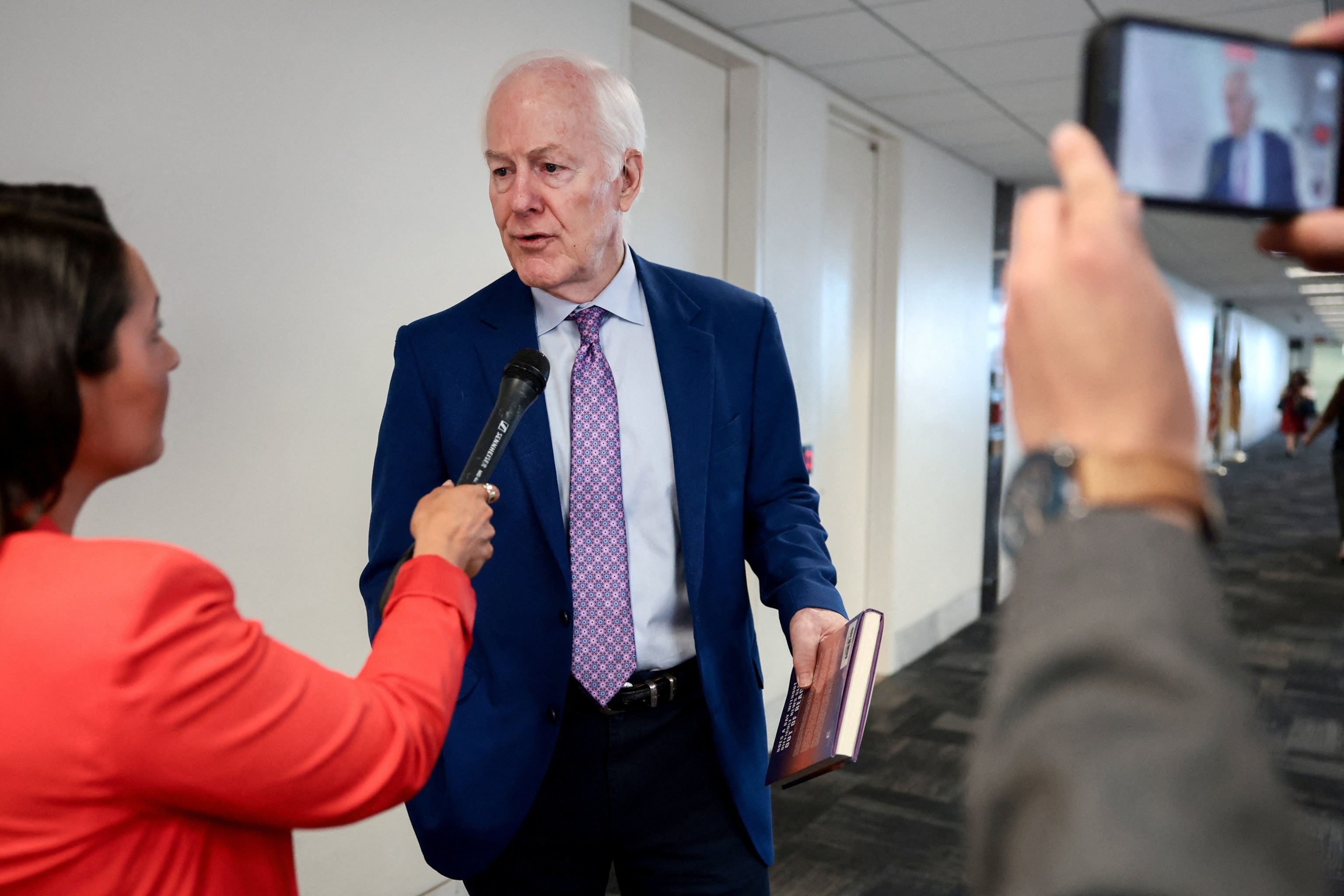 Sen. John Cornyn speaks to reporters outside of his office, following the postponement of Acting Attorney General Todd Blanche's confirmation vote, on Capitol Hill in Washington, July 30, 2026.Evelyn Hockstein/Reuters