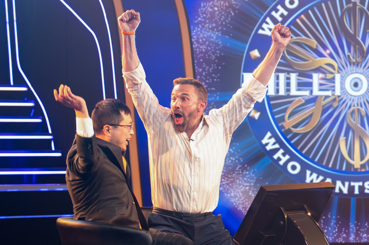 Ben Affleck and Jamie Ding in "Who Wants To Be a Millionaire."Eric McCandless / Disney