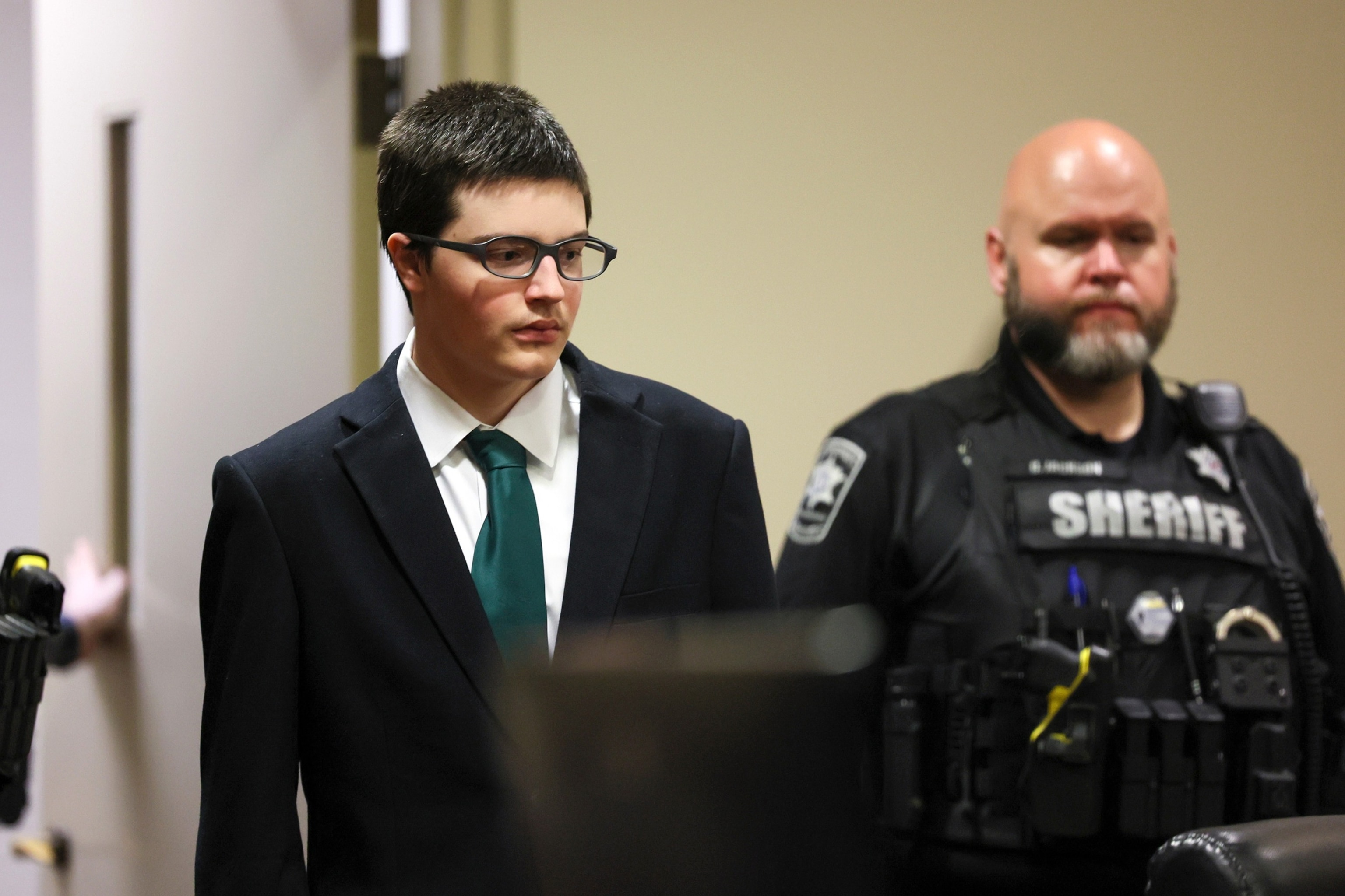 Colt Gray, the 16-year-old Apalachee High School shooting suspect, is led in by deputies for his sentencing at Barrow County Superior Court, on July 27, 2026, in Winder, Ga.Jason Getz/Atlanta Journal-Constitution, Pool via AP