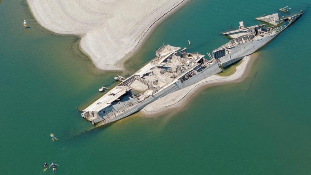Image caption,Among the wrecks exposed by the low levels of the Danube was a World War Two German warship at Prahovo in Serbia