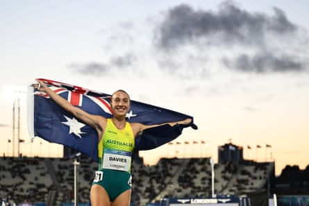 Rose Davies drapes herself in the Australian flag after winning her second gold medal of these Games.Photograph: Joel Carrett/AAP
