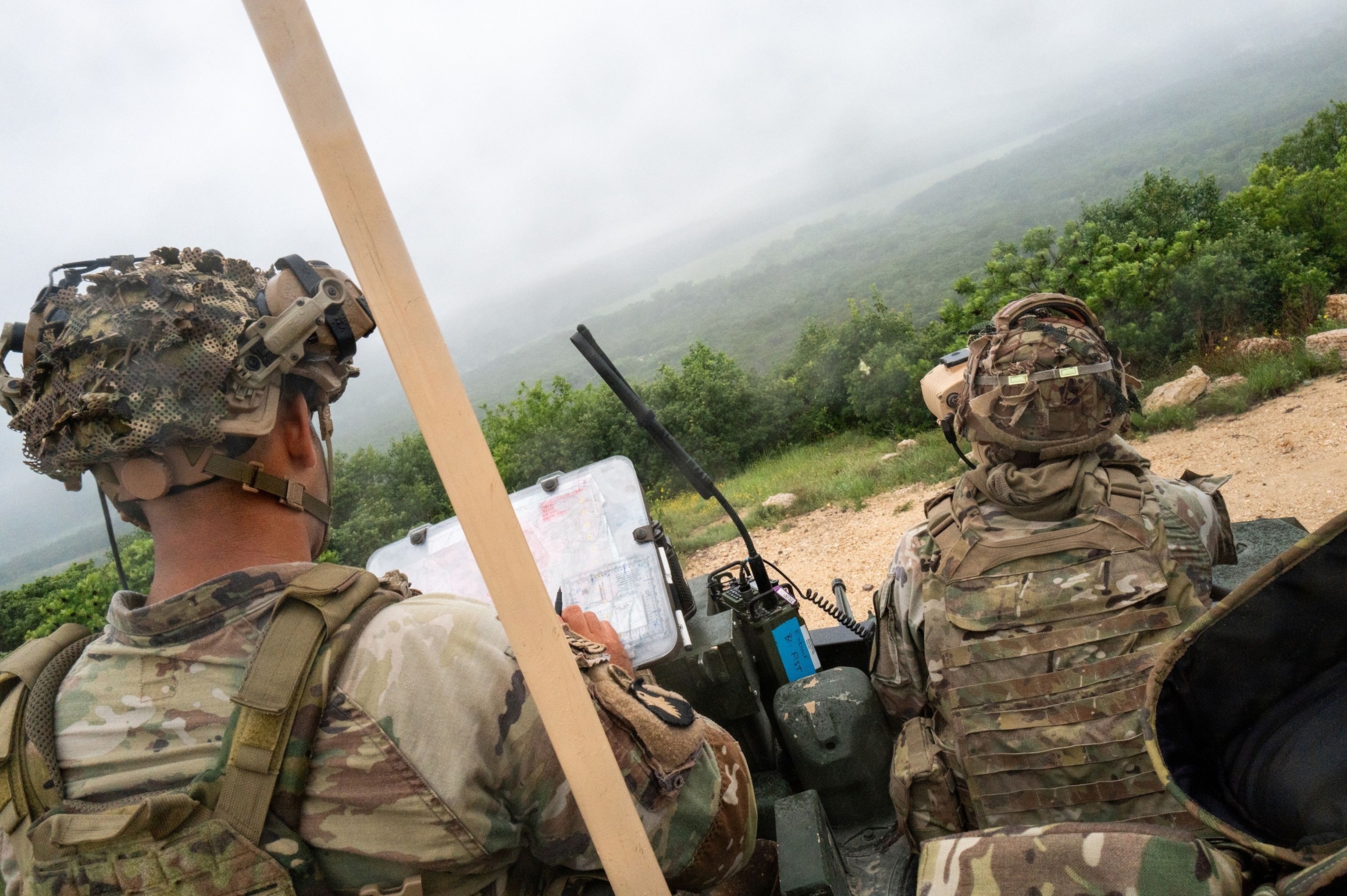 Army soldiers with the 1st Battalion, 82nd Artillery Regiment, 1st Cavalry Division Artillery lookout atop a M109 A7 Paladin self propelled Howitzer during live fire training on April 29, 2026 in Fort Hood, Texas.Brandon Bell/Getty Images