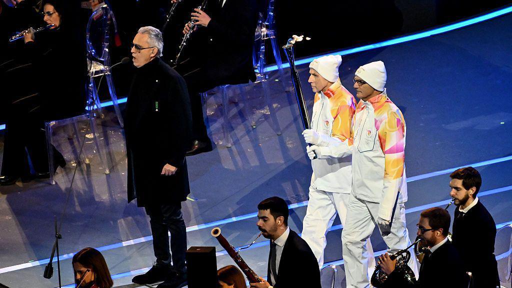 Image caption,Baresi and his former Italy team-mate and Inter Milan legend Giuseppe Bergomi were two of the torchbearers at the Winter Olympics opening ceremony earlier this year