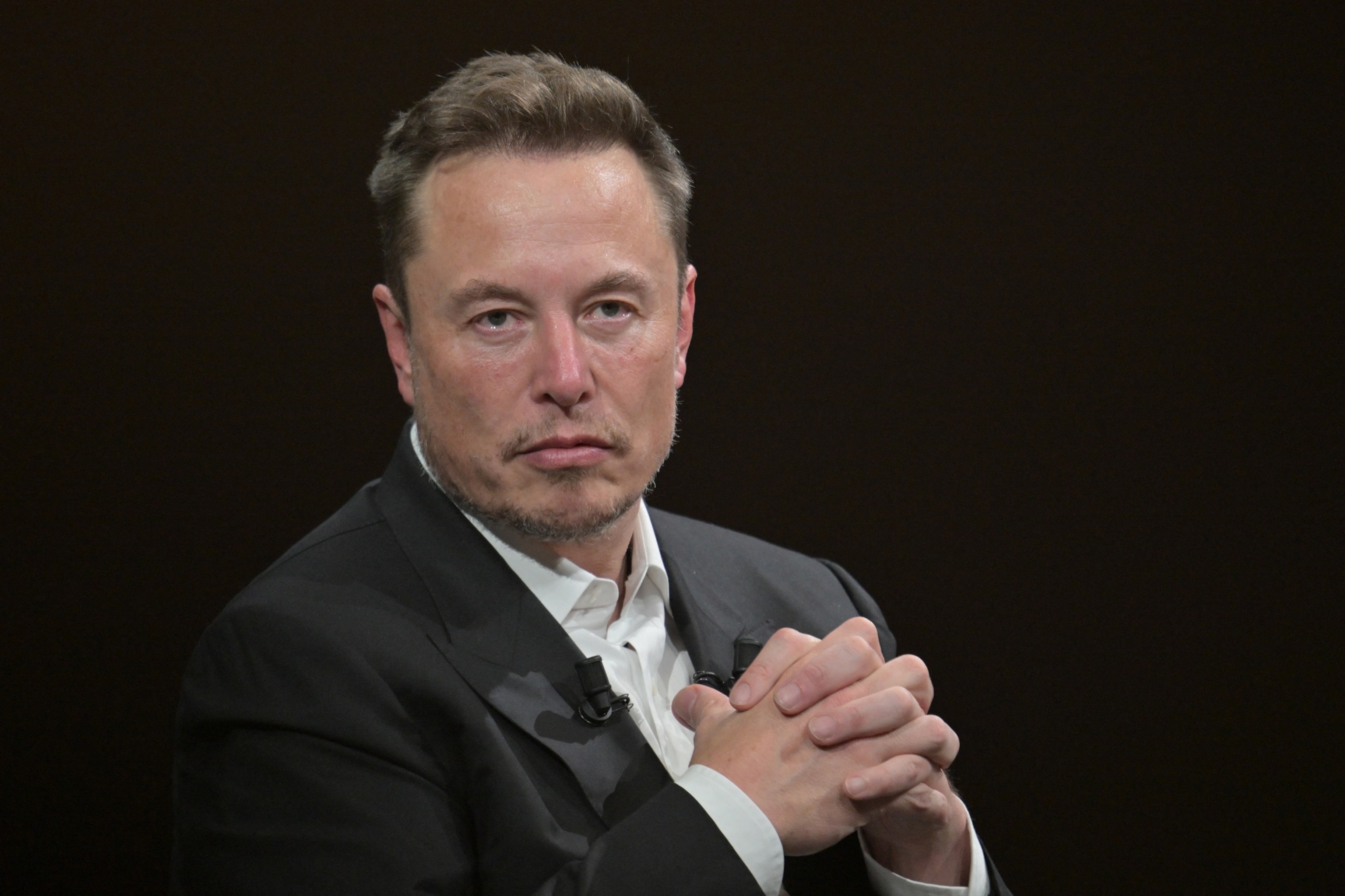 SpaceX, Twitter and electric car maker Tesla CEO Elon Musk waits to speak during his visit at the Vivatech technology startups and innovation fair at the Porte de Versailles exhibition center in Paris, June 16, 2023.Alain Jocard/AFP via Getty Images