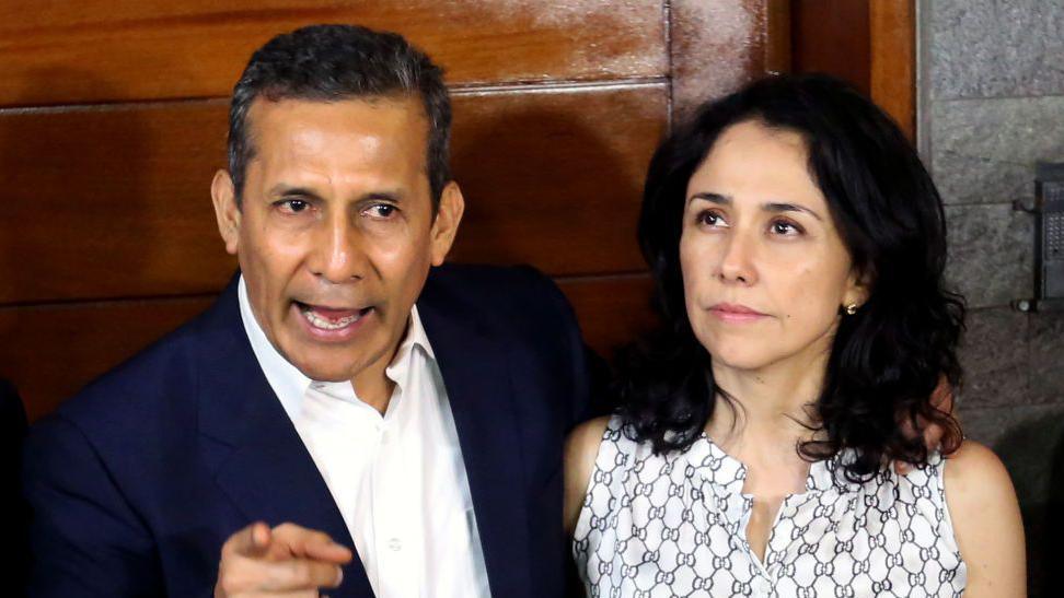 Image caption,Humala's wife Nadine Heredia (right) had also been convicted of money laundering offences, but was granted safe passage to Brazil