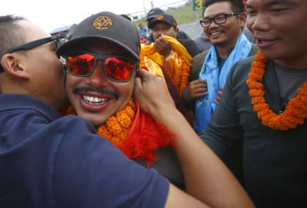 Nirmal ‘Nims’ Purja and his Project Possible team are congratulated after successfully scaling all 14 mountains above 8,000 metres in just over six months.Photograph: Skanda Gautam/Zuma Wire/Rex/Shutterstock