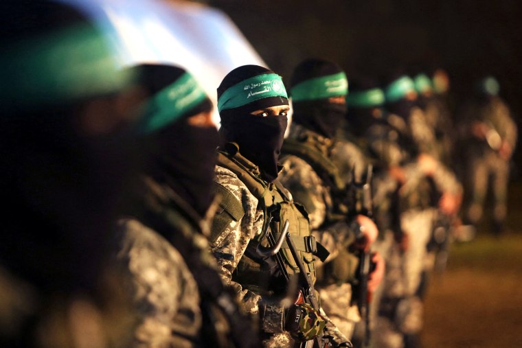 Palestinian members of the Ezzedine al-Qassam Brigades, the armed wing of the Hamas movement.Mahmud Hams / AFP via Getty Images