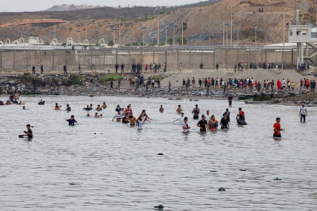 Some people decide to return to Morocco from the Spanish enclave of Ceuta on Friday.Photograph: Antonio Sempere/AP