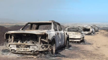 The remains of cars in Bédar. Many of the 13 killed in the fire died in their vehicles as they tried to flee.Photograph: Atlas/Reuters
